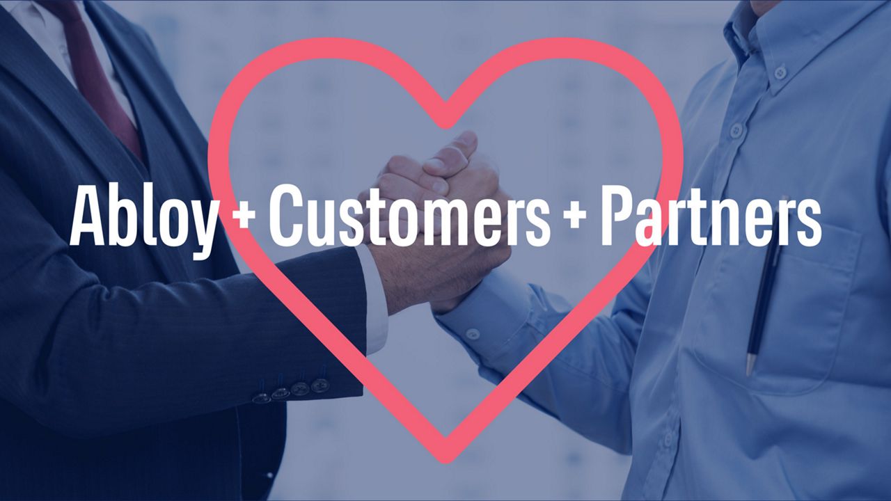 Two business people shaking hands