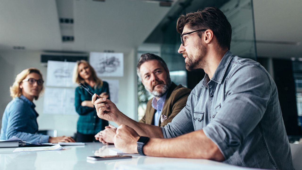 People discussing in a meeting