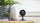 Indoor wifi camera on a table with plants