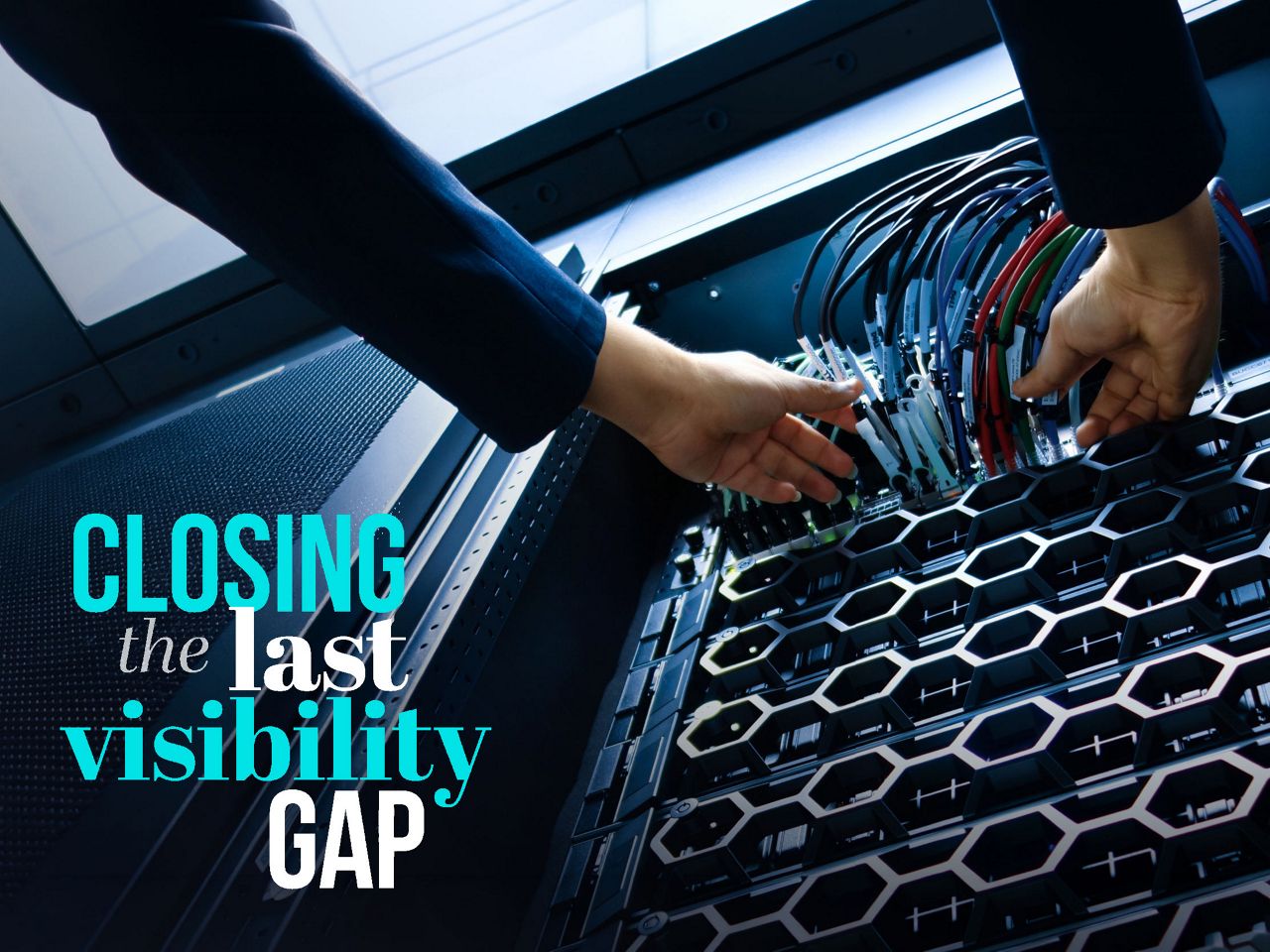 Data center technician working on data rack