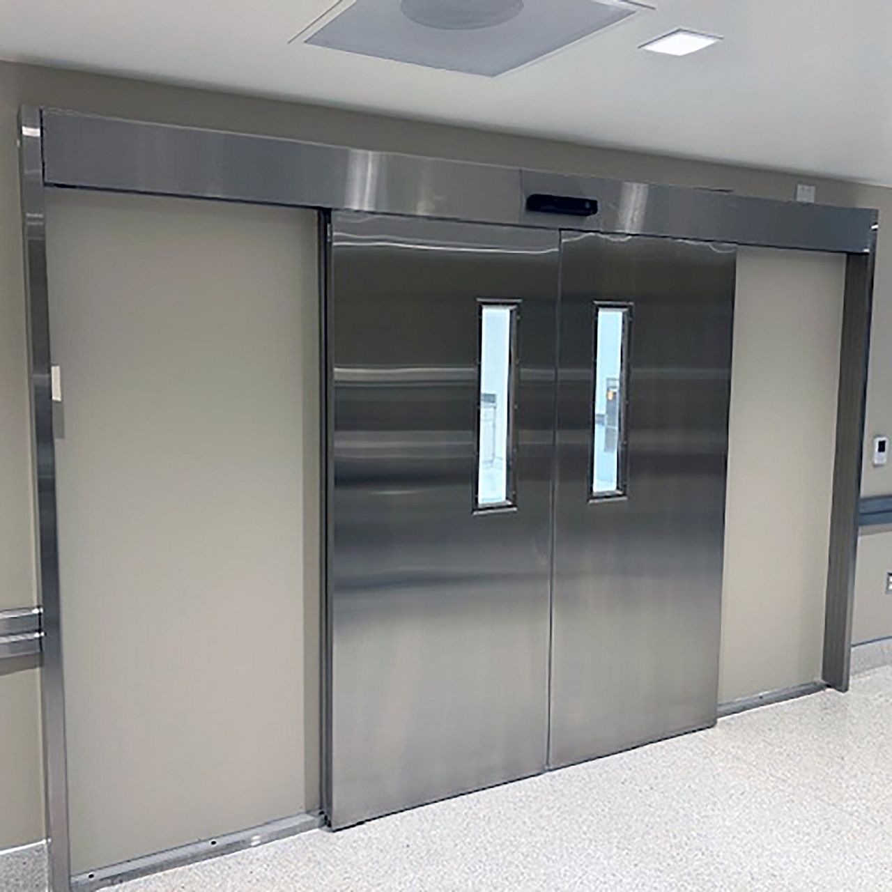 A cladded aluminum sliding door on a science lab entrance.