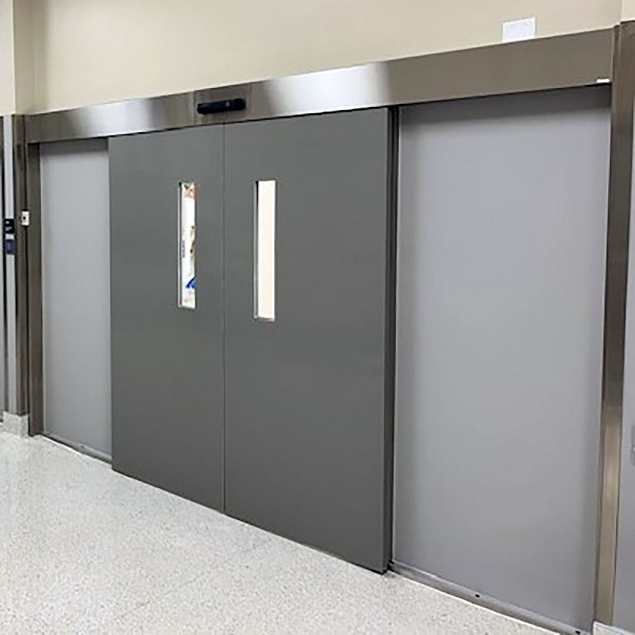 A cladded aluminum sliding door on a science lab entrance.