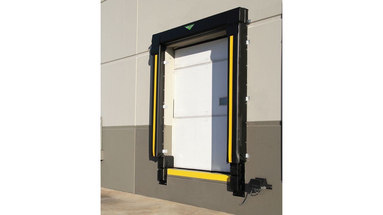 A dock seal with high-abrasion fabric and head pad, designed for superior environmental control and resistance to wear from trailer movements.