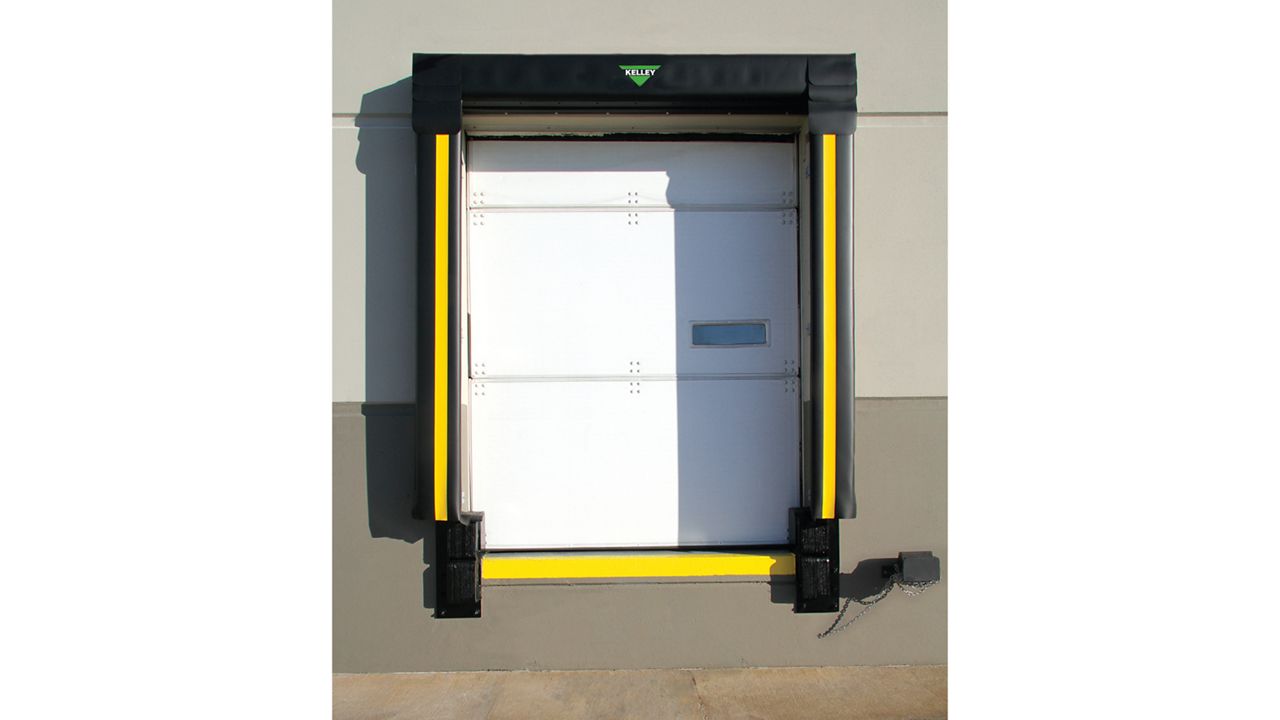 Side view of dock seal with high-abrasion fabric and head pad, designed for superior environmental control and resistance to wear from trailer movements.