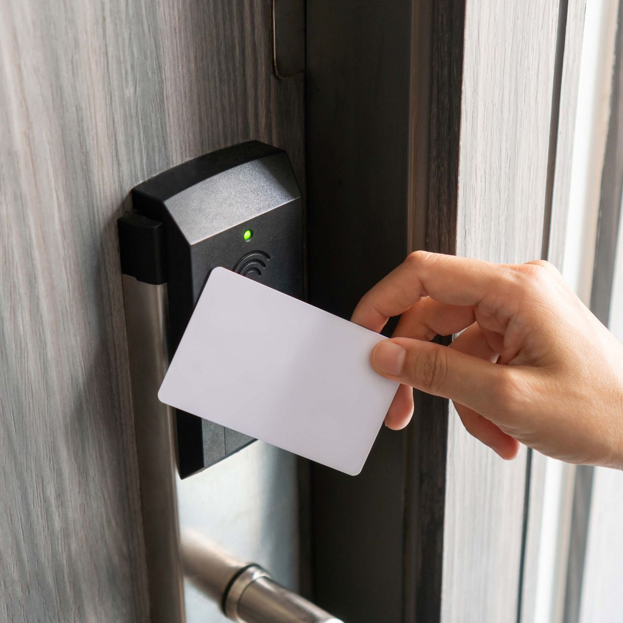 Woman using access control card