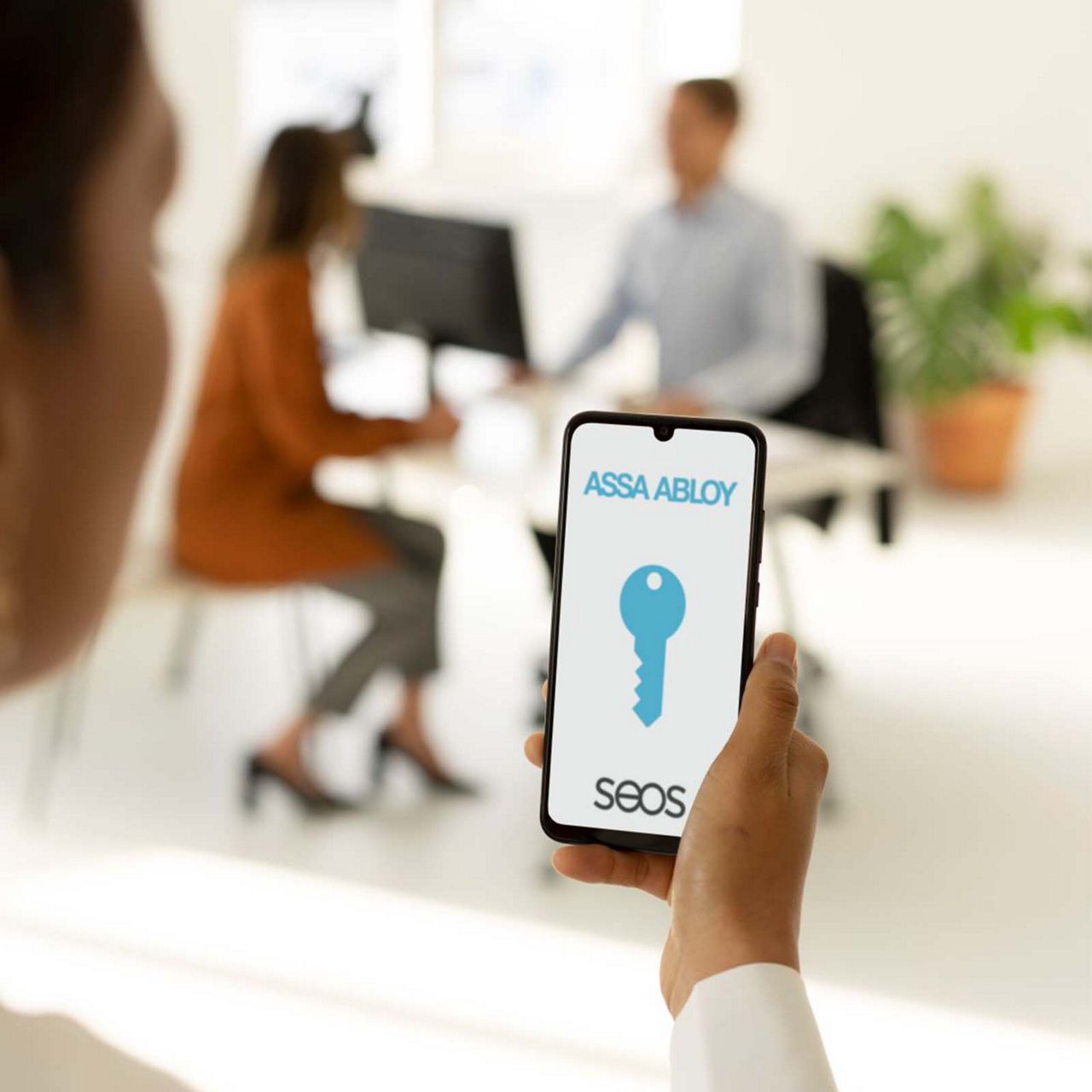 Image: Access Control Woman Android in hand