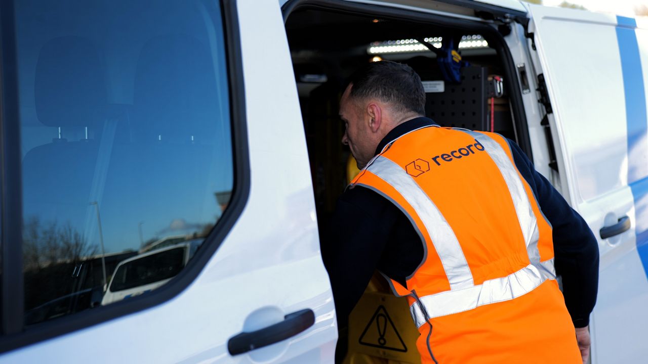 Record automatic door service engineer in van