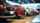 Row of new cars in automotive showroom