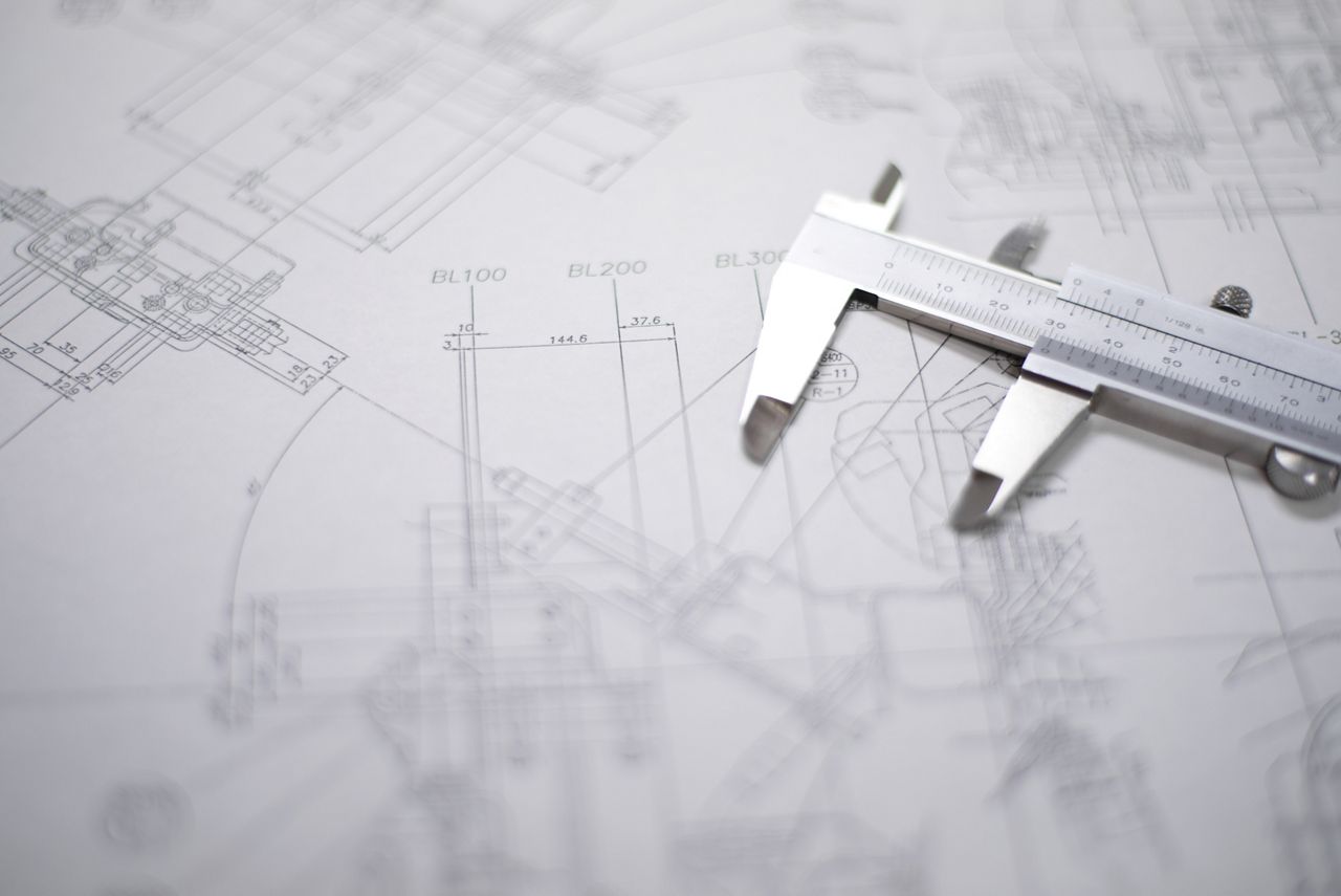 A protractor on a blue print