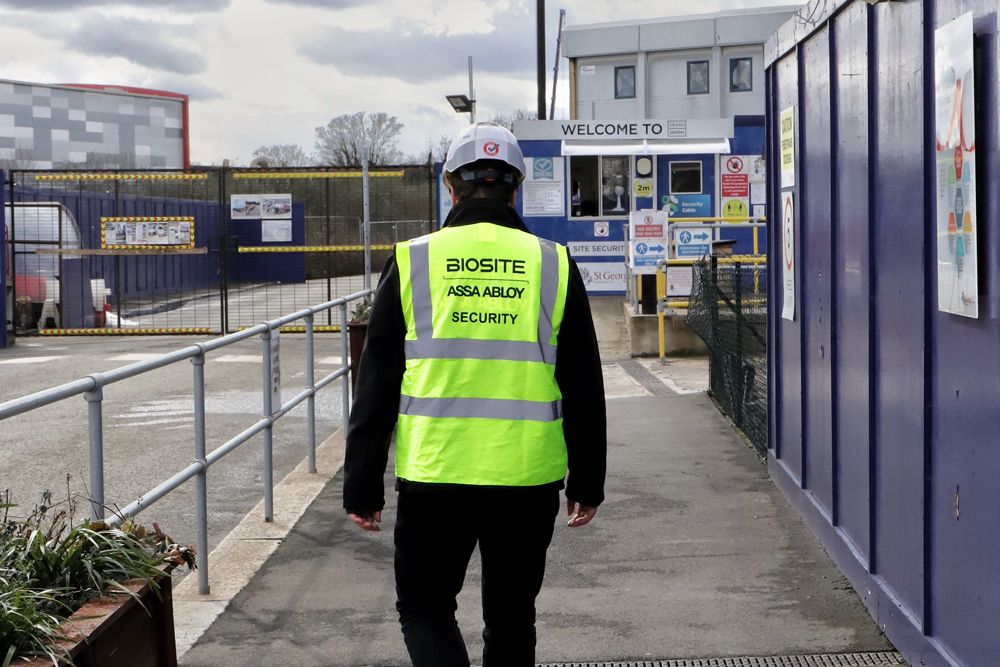 A security guard patrols site 