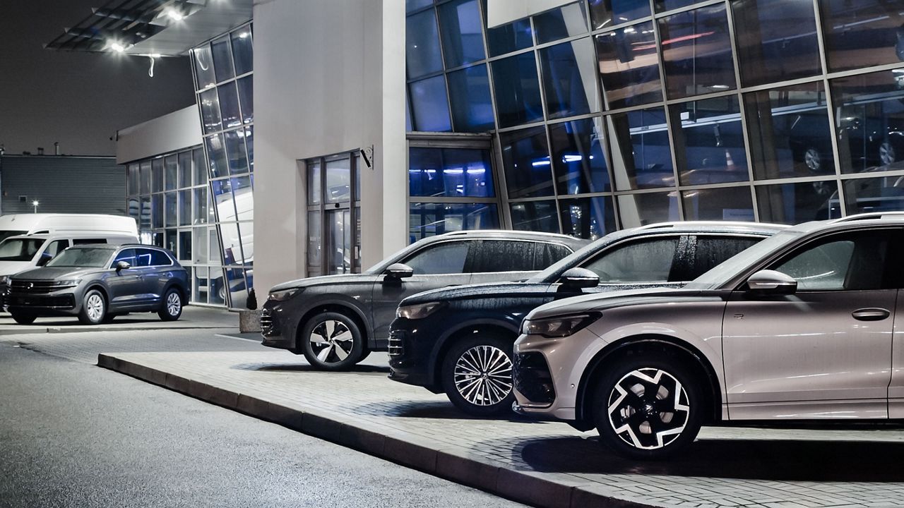 Car dealership at night