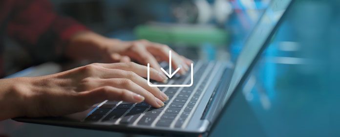 Manos escribiendo en el portátil.