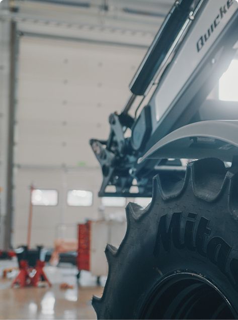 Wheel on a truck inside a garage