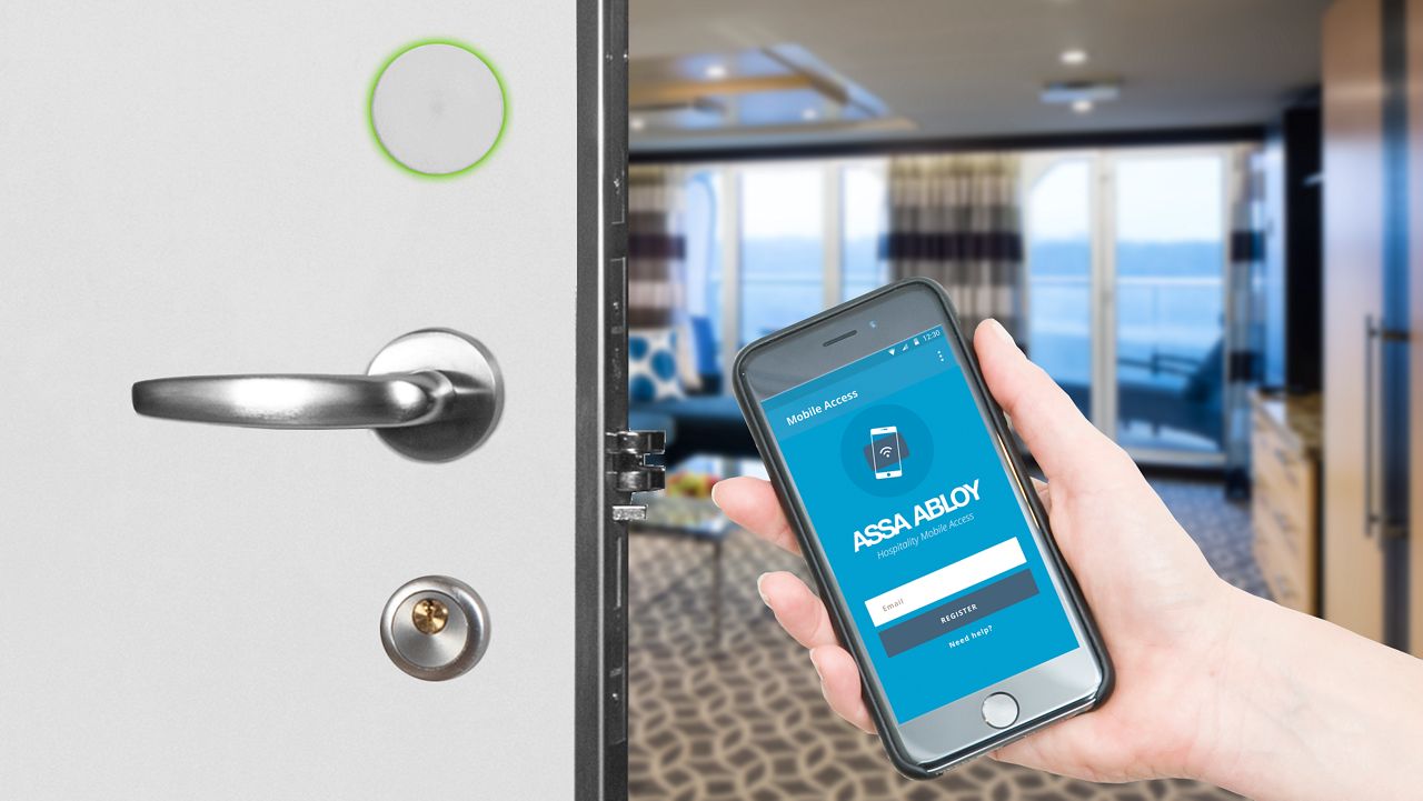 Marine eStore, smart phone in hand with login page on the screen