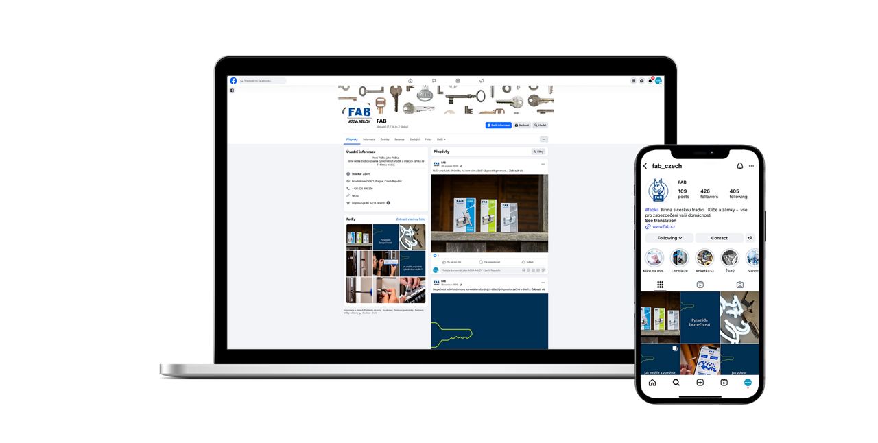Počítače s otevřenou stránkou Facebook a telefon s otevřeným Instagramem