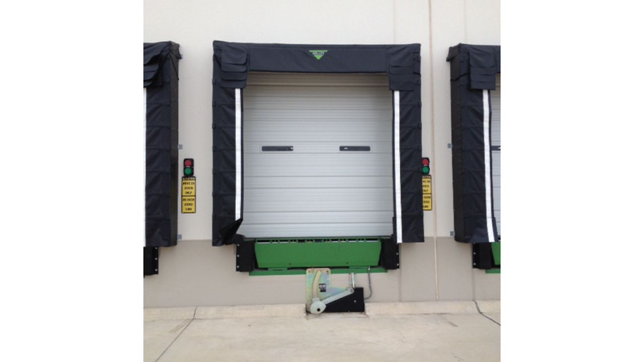 One Kelley FSR1000 FoamSide Dock Shelter installed outside.