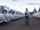 Fleet manager walking through rows of vehicles