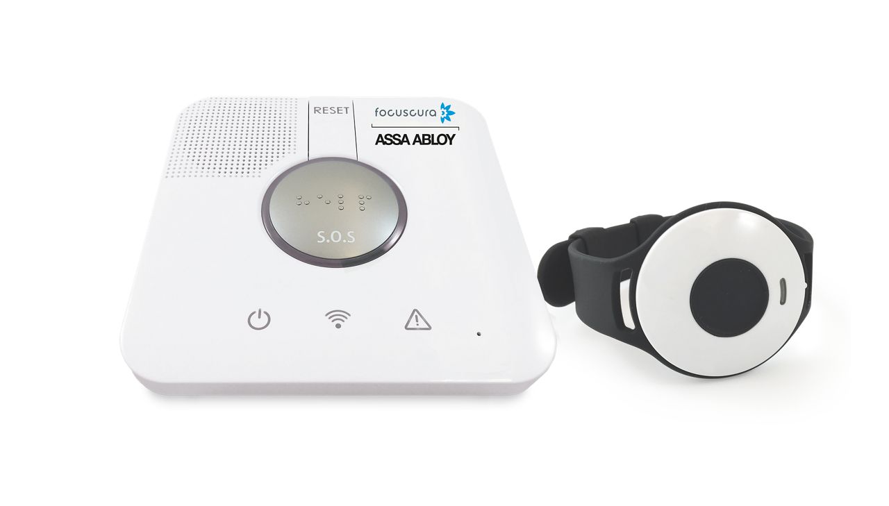 Thuiszorgtelefoon en alarmeenheid met het merk Focuscura ASSA ABLOY.
