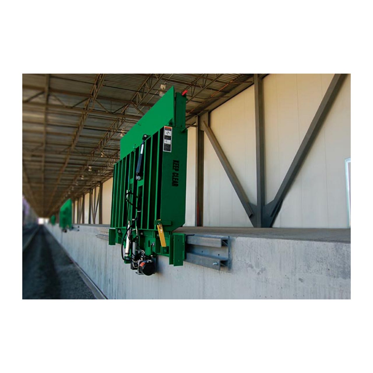 Hydraulic-powered vertical storing loading dock leveler for rail applications. 