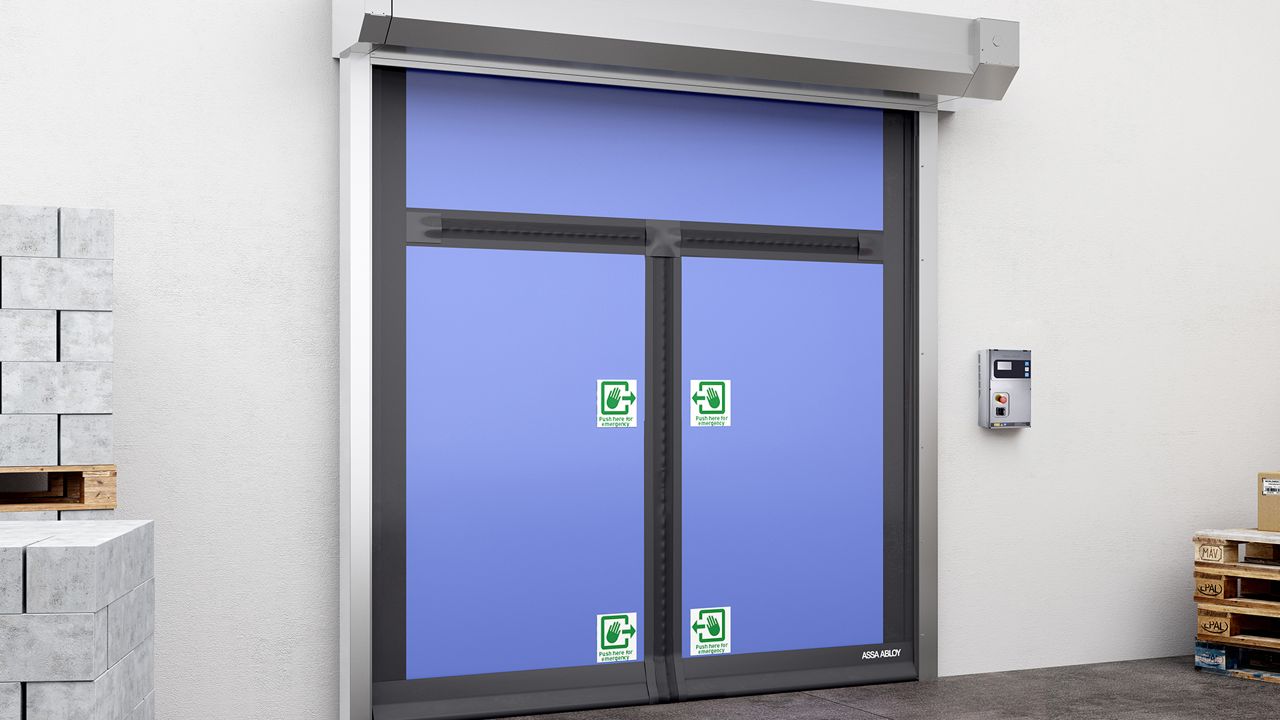 A blue compact door in the centre and stacks of grey bricks on the sides of the door. 