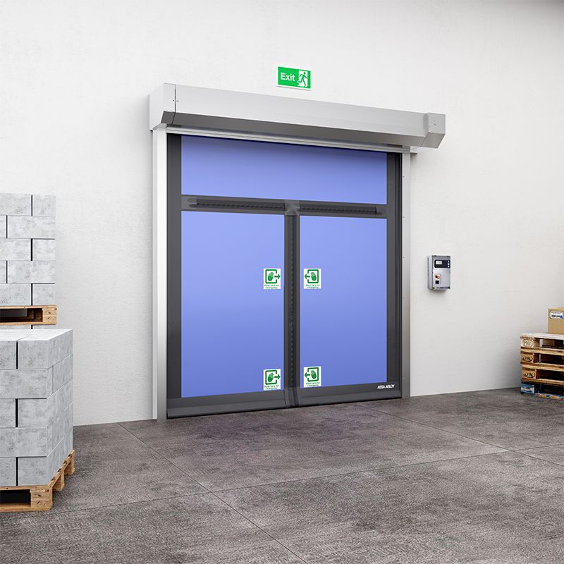 A blue compact door in the centre and stacks of grey bricks on the sides of the door. 