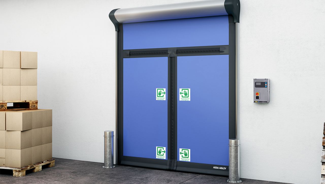 A blue compact ASSA ABLOY high speed door for emergency exits