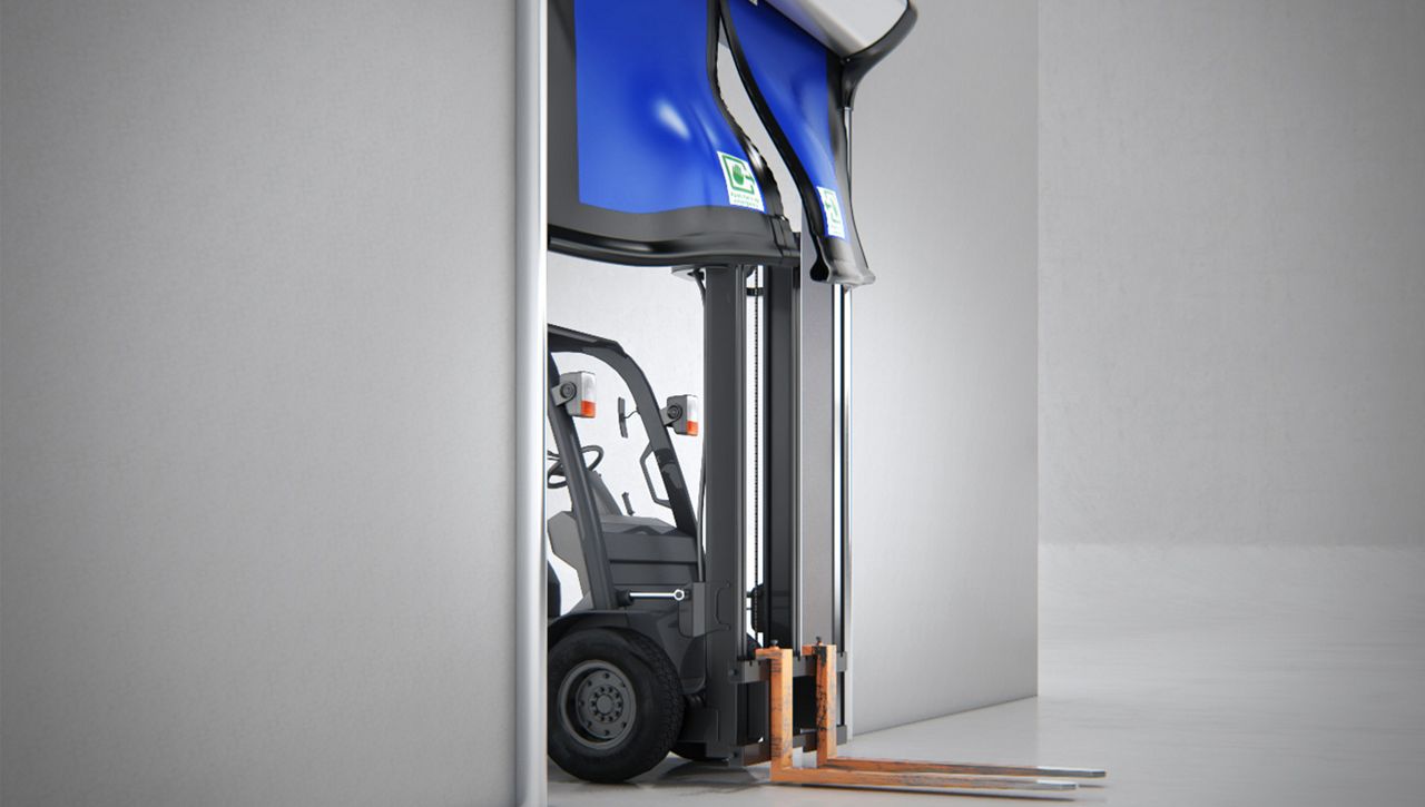 Image: The ASSA ABLOY high speed door for emergency exits, features a break-away self repairing curtain