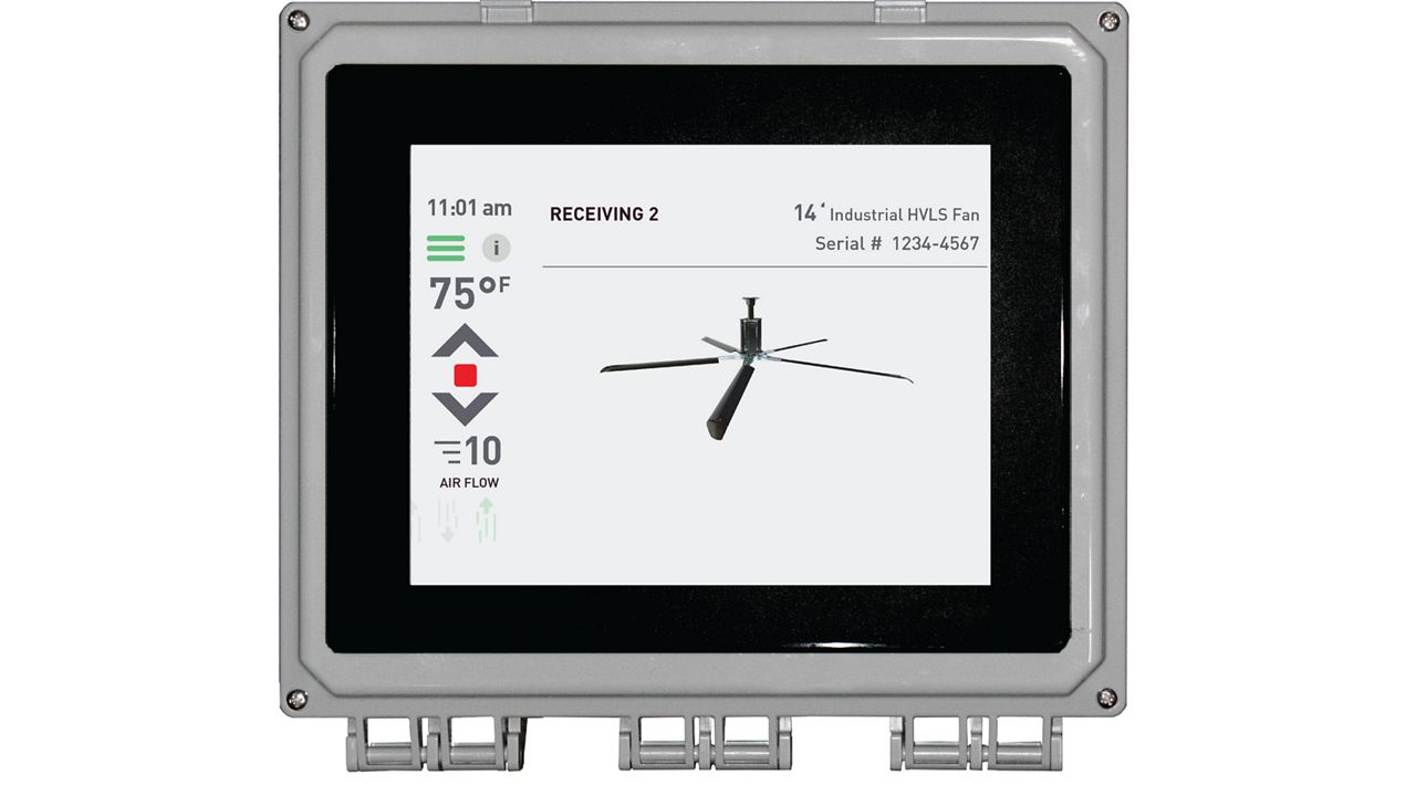 A control panel with black edges and a silver mount showing an image of a fan and information about temperature and airflow