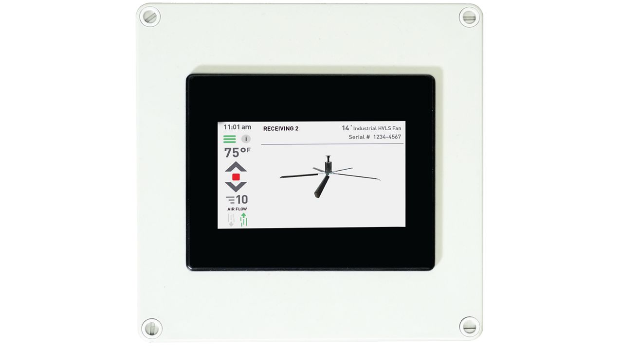 A control panel with black edges and a white mount showing an image of a fan and information about temperature and airflow