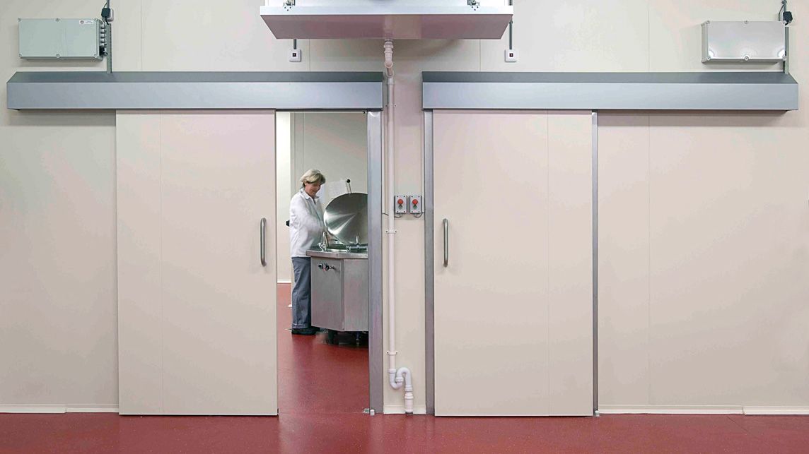 sliding refrigerator door suitable for a food-safe environment.