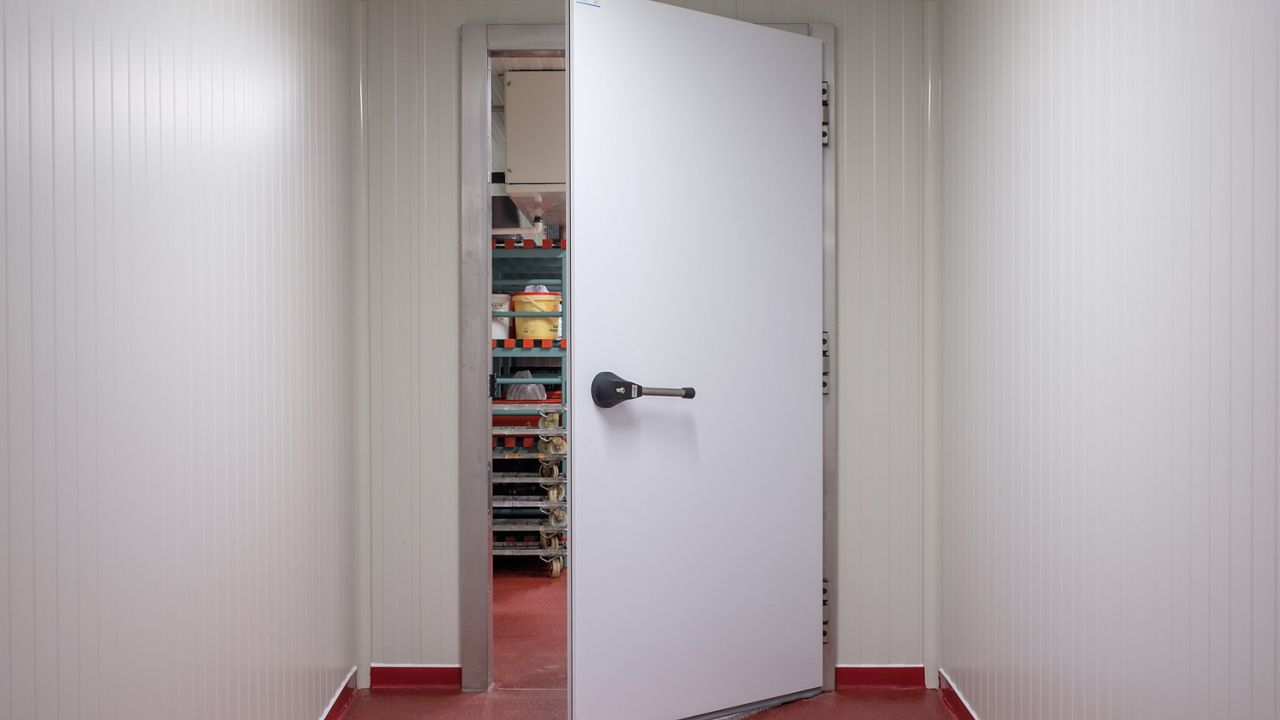 Image: The ASSA ABLOY CI KDM Chiller is a hermetically sealed hinged door designed for refrigerated environments.