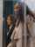 Women walking through automatic sliding door