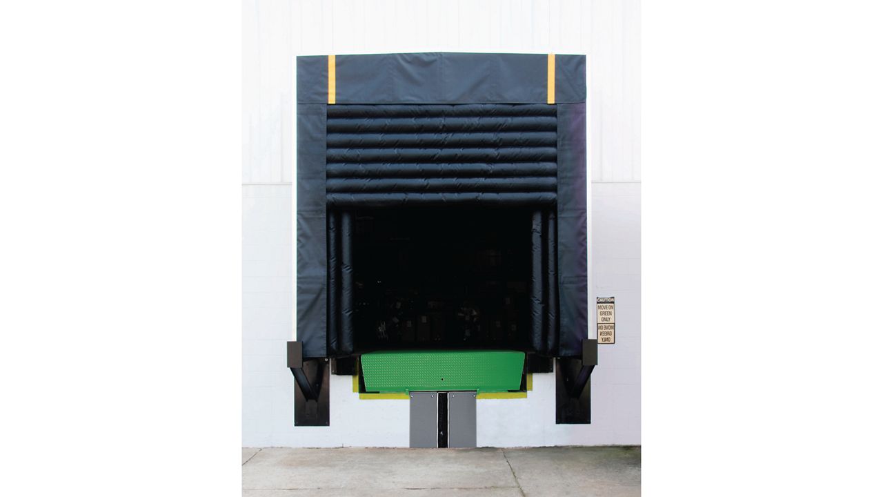 A specialized inflatable dock shelter for wider and taller doorways, accommodating a range of vehicle sizes, including those with extended tailgates or hydraulic lifts. Features translucent panels for maximum lighting on the dock.