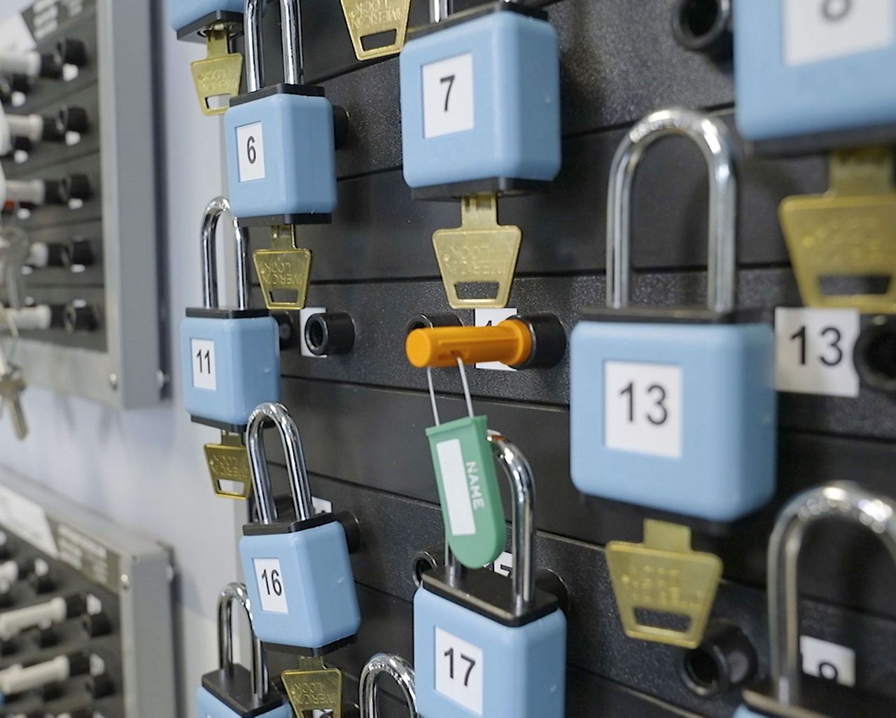 User inserting Access Peg into KEYper Mechanical Key Board