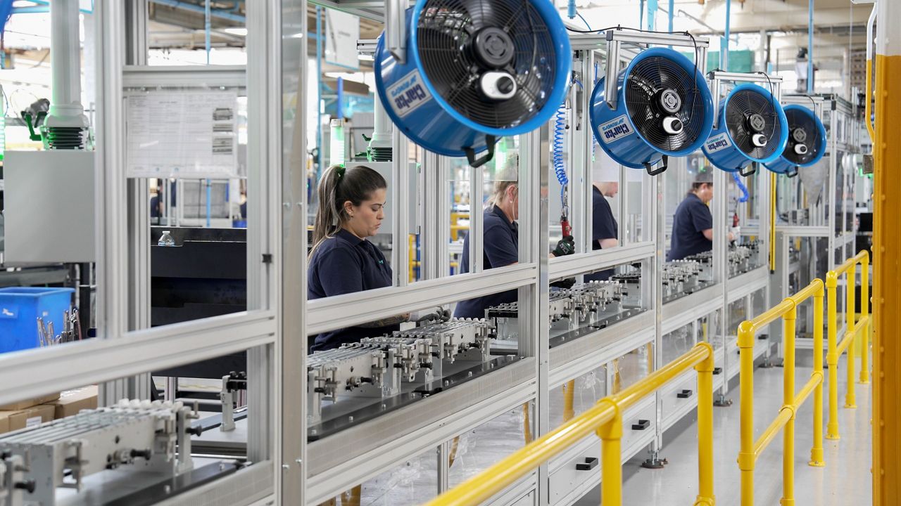 Workers on a Production Line