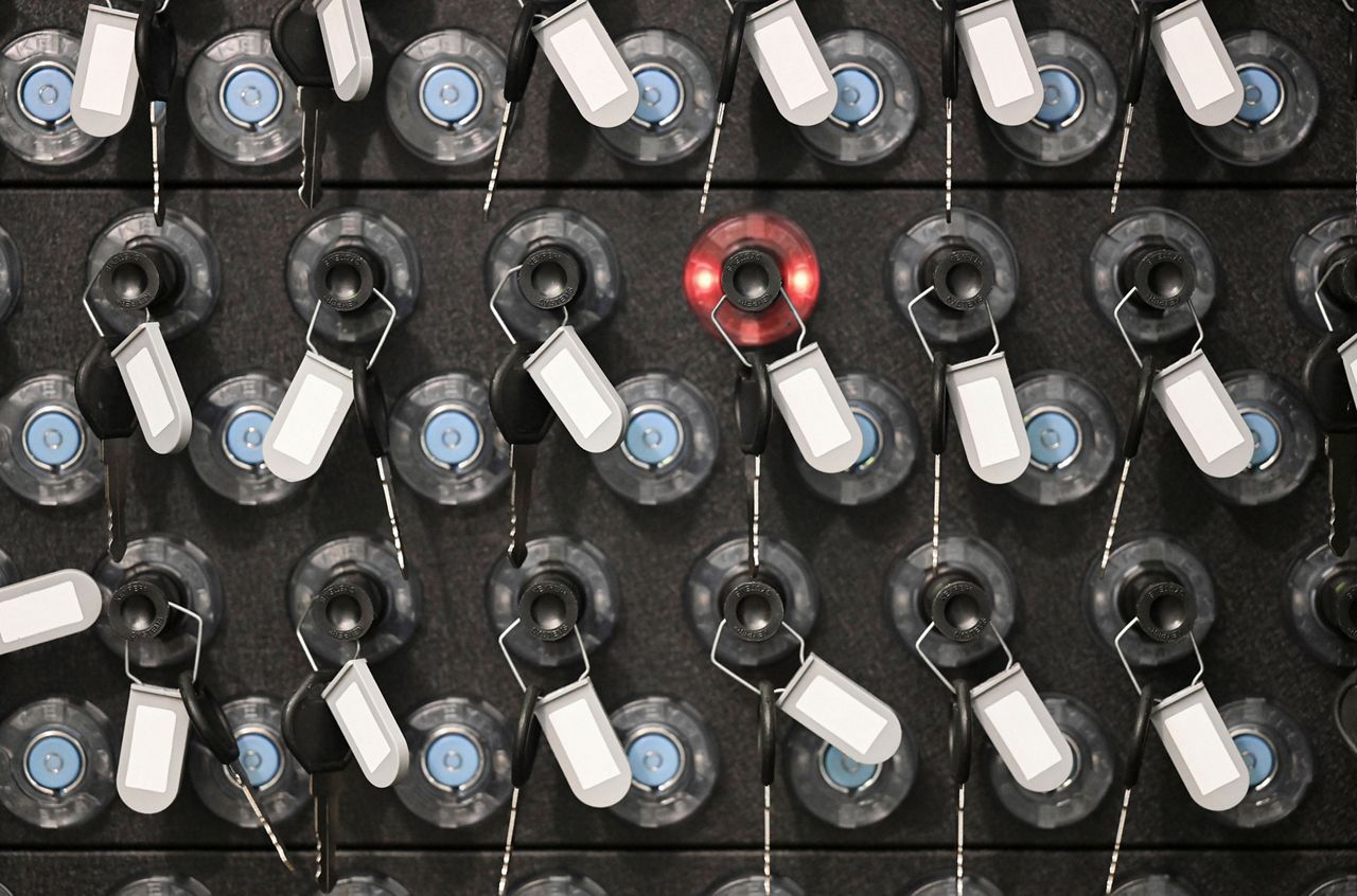 MX panel inside cabinet with lit up fob