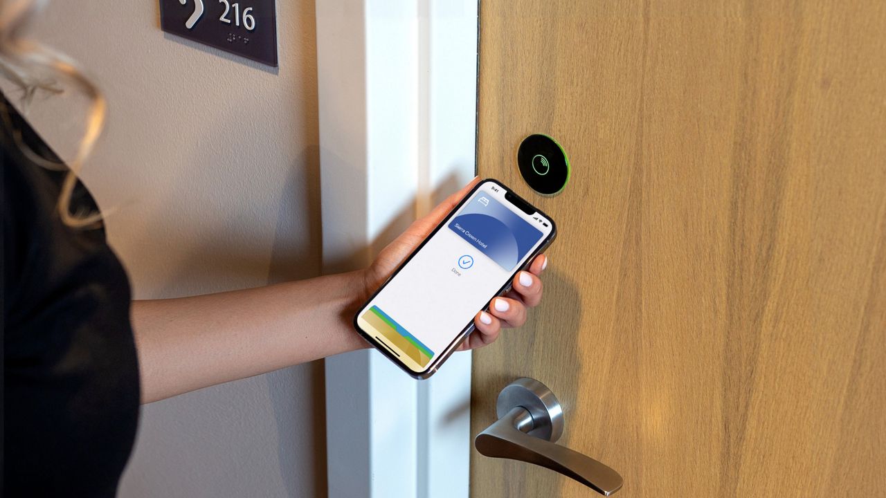 Opening hotel door using mobile access technology