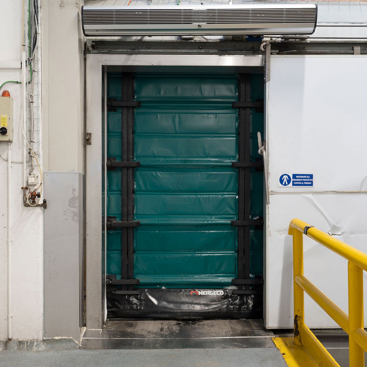 A green freezer door.