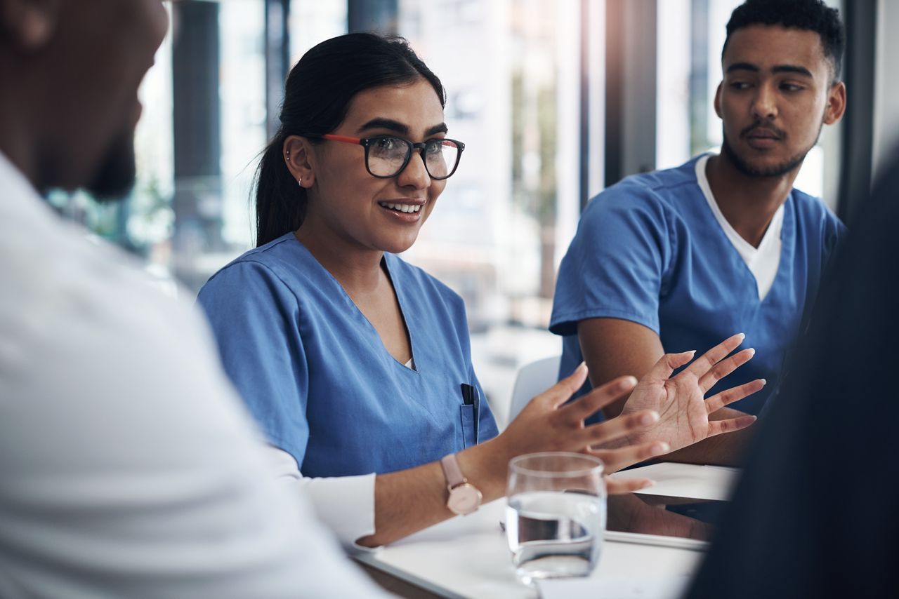 Doctors and nurses in a metting-