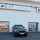 External image of two Crawford OH1042F Overhead Sectional Door at BMW car dealership in the UK