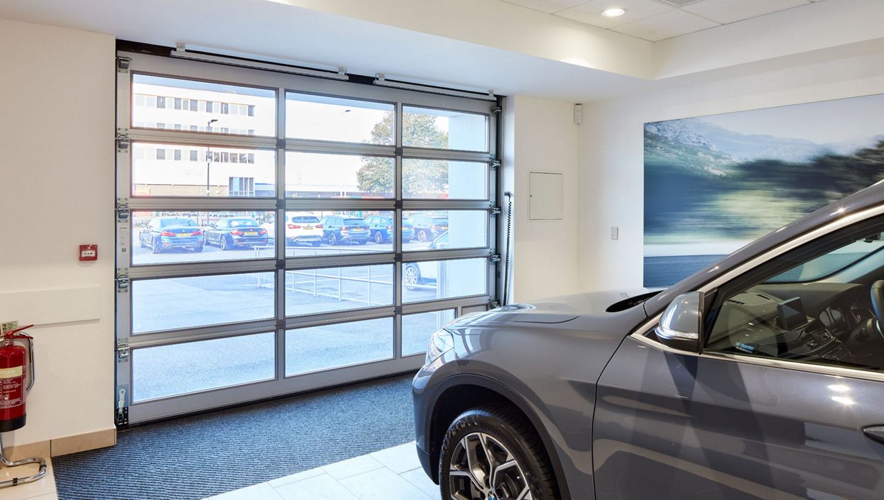 Image: Internal image of Crawford OH1042F Overhead Sectional Door at BMW car dealership in the UK