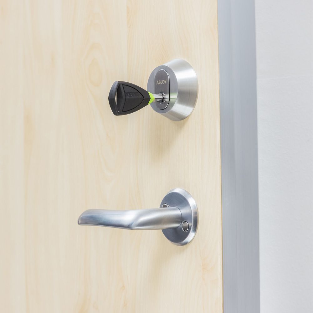 En PULSE digital nøgle bliver programmeret med adgangsrettigheder