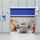 Porta di protezione macchine ASSA ABLOY RP400 blu aperta con macchine che lavorano dietro di essa