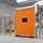 Porta di protezione macchine ASSA ABLOY RP400 arancione chiusa con macchine che lavorano dietro una recinzione