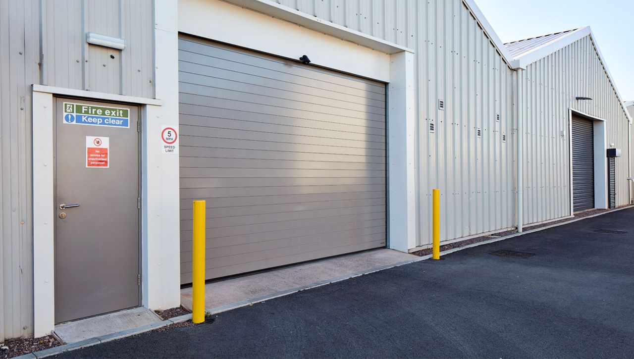Image: External view of a RR3000 ISO high speed door at a BMW car dealership