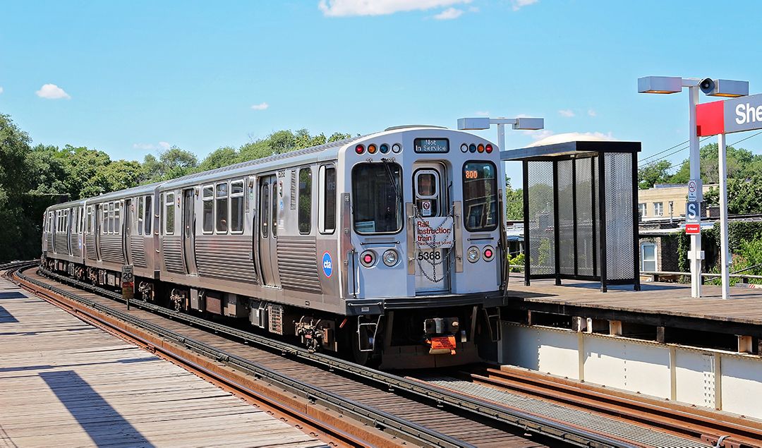 A train at a rail road stop.