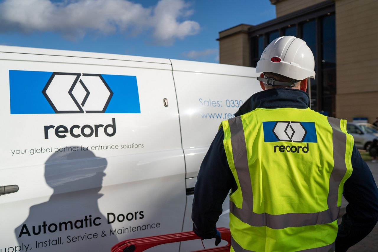 Service technician infront of service car