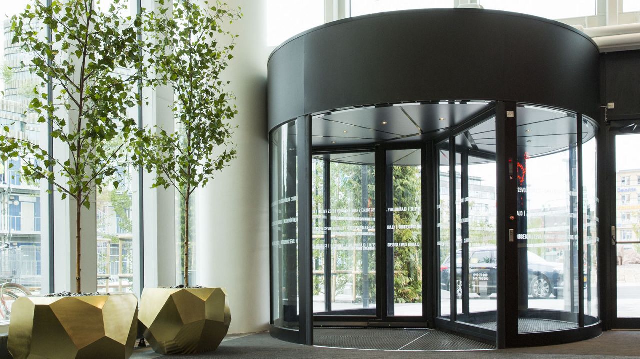 Revolving doors in a hotel lobby.