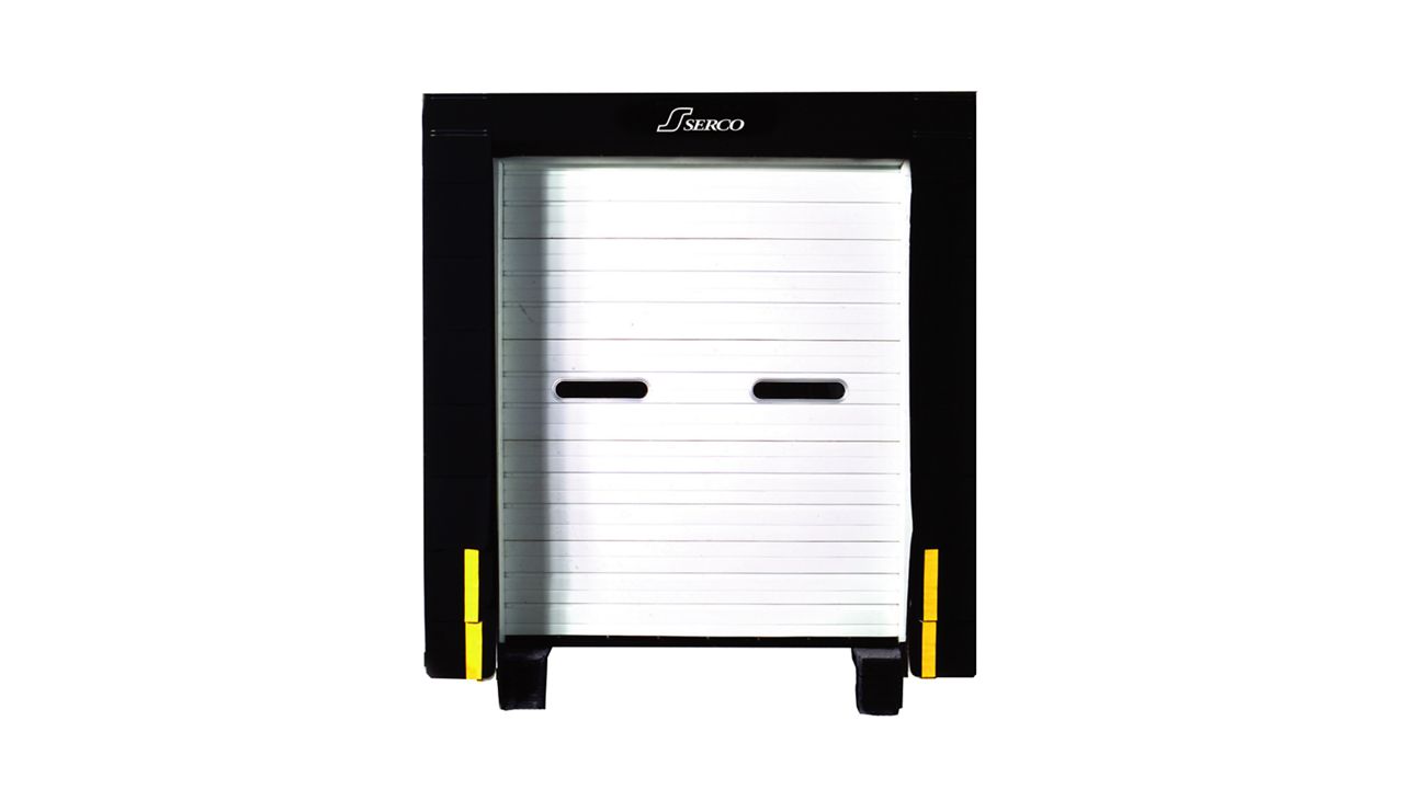 A white door with a black dock seal.