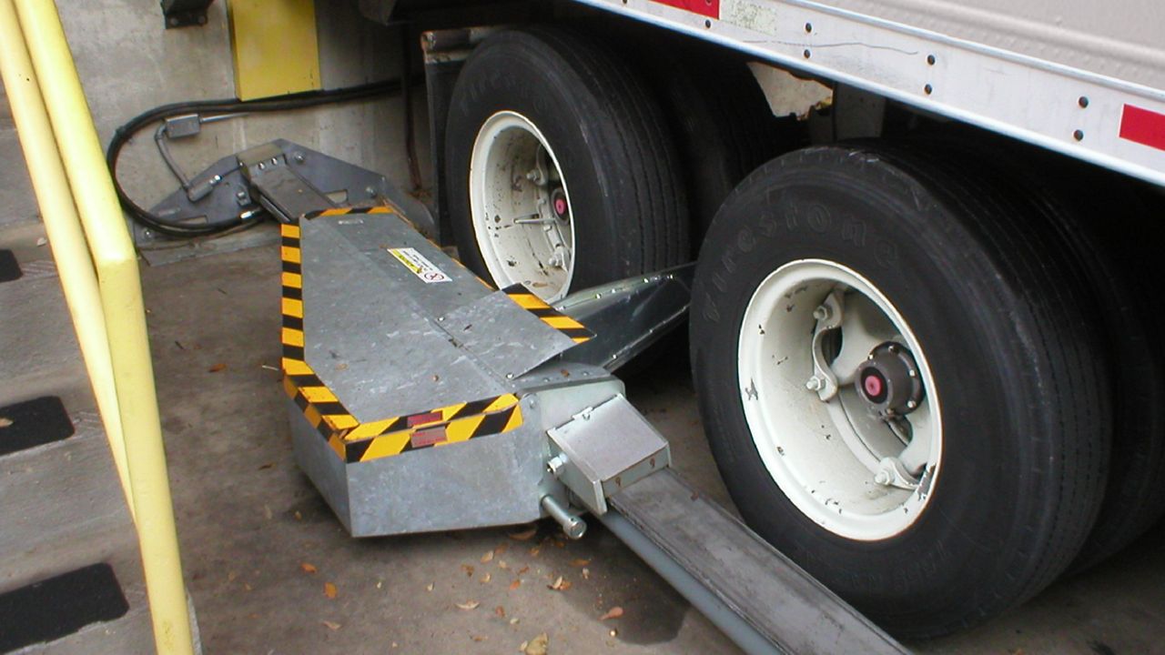 Close-up of a surface-mounted device engineered for dependable wheel restraint and vehicle safety.